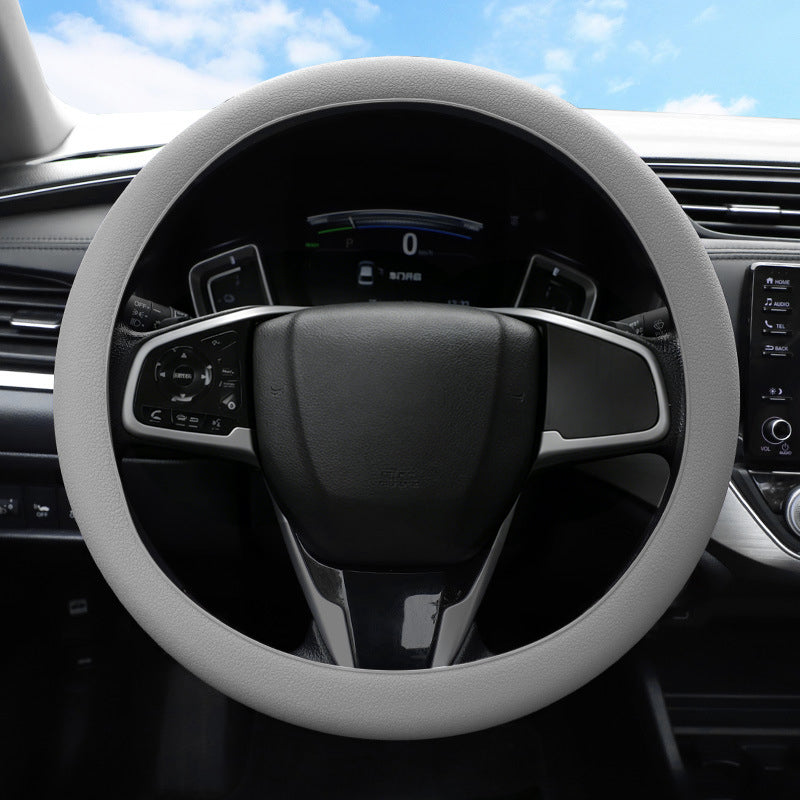 🚗Housse de volant en silicone — Prise en main antidérapante, confort et style en toutes saisons
