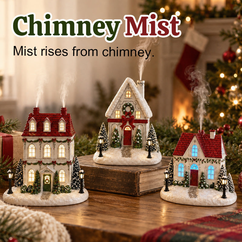 🎄✨ Diffuseur « La maison de Noël de Mistletoe Lane » — Diffuseur festif représentant un village de Noël avec des fenêtres illuminées et une charmante brume de cheminée